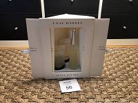 Front view of boxed Issey Miyake L'Eau d'Issey Pret A Ready fragrance gift set showing included 50ml eau de toilette, shower gel, and body lotion.