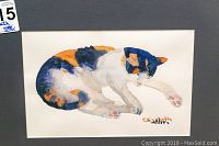 Close-up image of the original watercolour painting of a sleeping calico cat, showing the signature of Elizabeth Betty.