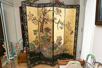 Front view of four-panel folding screen with birds and floral painted design on gold background unique decorative border