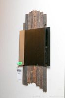 Full front view of rectangular artisan mirror with reclaimed wood frame, showing 12x26 reflective surface mounted on uneven vertical planks.