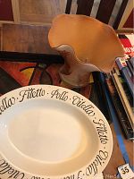 Photo showing the lacquered serving tray and the glass art vase beside the ceramic pasta platter.