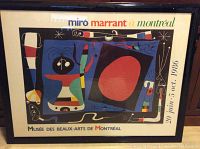 Full view of framed colorful Joan Miró lithograph poster with exhibition details from Montreal 1986.
