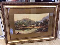 Front view of the framed watercolor painting showing the entire artwork and the gilded frame.