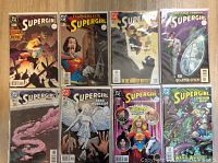 Eight DC Supergirl comic books, arranged in two rows of four, all bagged and boarded in excellent condition, showing varied cover art from serious dramatic scenes to superhero action shots.