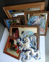 View showing all six bar mirrors and the Lowenbrau lion sign stacked together to display condition and framing details