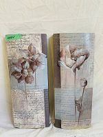Two rectangular wall art panels with flowers and script text background in neutral colors, slightly curved shape.