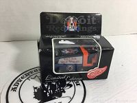 Front view of collectible Zamboni in black display box showing Detroit Red Wings logo and 'Limited Edition' label.