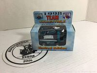 Photo of unopened 1998 NHL Team Collectible Zamboni box with San Jose Sharks design, showing front and side view.