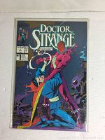 Front cover photo of Doctor Strange Sorcerer Supreme Issue 1 comic book in protective sleeve showing cover art and title.