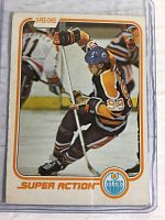 Front photo of 1981 O-Pee-Chee Wayne Gretzky hockey card #125 showing action image of Gretzky skating in Oilers uniform.