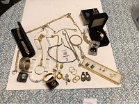Overview of all jewelry pieces laid out on white background.