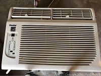 Top front view showing grille, vents and control panel