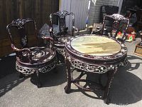Full set: round table and three matching chairs shown from front.