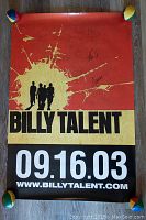 Red and yellow Billy Talent concert poster signed by band members