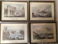 Four framed Canadian prints displayed together on a surface, showing four detailed print artworks in wooden frames.
