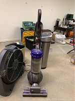 Dyson Cinetic Big Ball Animal vacuum cleaner upright view showing spherical ball and handle.