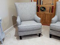 Front-left view showing chair silhouette, pattern and legs