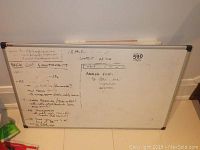 NOBO whiteboard with notes on the surface, showing size and condition with visible scratches and some markings.