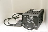 Side perspective of the Sona up/down converter showing power cord and ventilation slots.