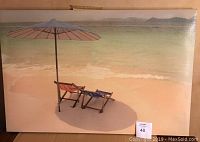 Photo of 36x24 canvas painting with two beach chairs and an umbrella on shore