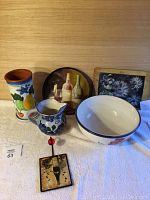 Group shot showing all ceramic items including pitcher, vase, bowls, trays, and butter knife holder