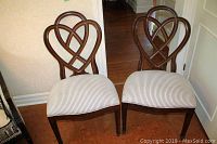 Front view of both chairs showing frames and seat upholstery
