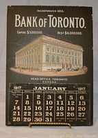 Front of vintage 1917 Bank of Toronto calendar showing illustration of bank building and January 1917 calendar.