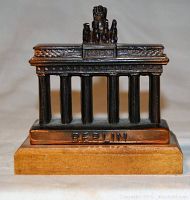 Front view of Brandenburg Gate paperweight showing 'BERLIN' engraving on base