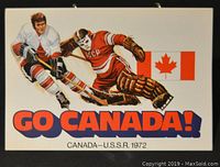 Front side of one postcard with illustration of Canadian hockey player and Soviet goalie, Canadian flag, and text 'GO CANADA! CANADA-U.S.S.R. 1972'