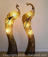 Pair of male and female peacock floor lamps illuminated, curved and detailed metal craft with stained glass effect