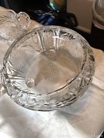 Close-up photo of the lead crystal footed bowl showing cut starburst and floral patterns on clear crystal glass.