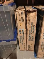 Two boxes of Hirsh 5-shelf heavy duty steel shelving, model TL582, 18" deep x 42" wide x 72" tall, stored in basement.