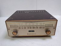 Front view of Bogen R660 tuner showing AM/FM frequency dial and two tuning knobs