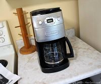 Photo of Cuisinart programmable coffee maker on kitchen counter.