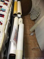 Rolled large-format posters stored in tube