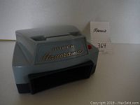 Single gray and black vintage handheld slide viewer with gold-tone 'Super Honorama' lettering on the front.