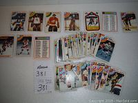 Top view showing front of a selection of 1978 O-Pee-Chee hockey cards with various player images and team icons.