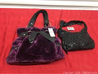 Pair of two brand new purses from Claire's, one purple faux fur with black straps and the other black sequined with bow detail.