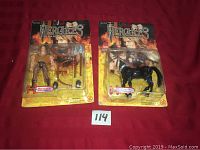 Two sealed Hercules The Legendary Journey figures on red background, left Hercules figure with accessories, right Centaur figure.