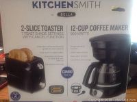 Box front showing Kitchen Smith 2-slice toaster and 12-cup coffee maker combo pack with features listed