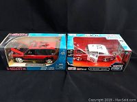 Maisto HEAT branded 2002 Cadillac Escalade SUV and Jada Diecast Rescue Force fire truck boxed and unopened