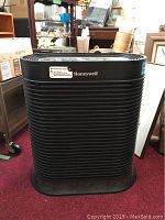 Front view of Honeywell air purifier showing brand and ventilation slats