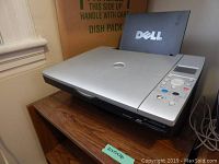 Dell all-in-one printer model 942, side angle showing input tray and Dell logo