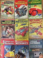 Top view showing all ten vintage magazines with colorful illustrated covers, titles and dates visible.