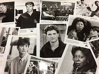 Twelve glossy 8x10 inch black and white and color promotional photos from the movie 'Ghost' showing various cast members in character.