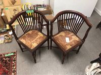 Pair of antique corner chairs placed side by side showing full front and top views