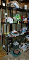 Full view of the wire shelving unit with kitchen items placed on shelves for size reference