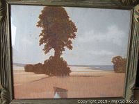 Full front view of the pastel landscape painting titled 'The Plains' inside the gilt wood frame with visible glass glare.