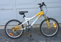 Full profile of Oryx Sprint 20 All Terrain Kids Bike showing frame, tires, pedals, and overall condition.