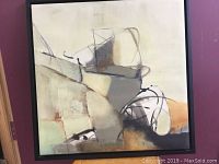 Front view of the modern abstract painting in its black frame, showing the full piece hung against a purple wall.
